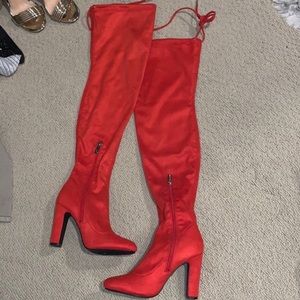 Red/orange suede boots
